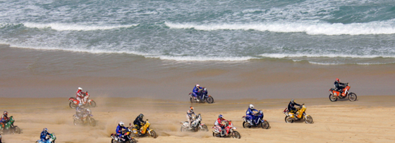 Bikers ride on the beach in Dakar during the 15th and final stage of the Dakar Rally, on Sunday. French biker Cyril Despres won his second Dakar Rally crown.