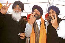Former Punjab Chief Minister Parkash Singh Badal, Mr Harinder Pal Singh and Mr Sukhbir Badal at a party meeting in Patiala