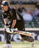 New Zealand�s Jacob Oram plays a reverse sweep off the bowling of England�s Monty Panesar during the tri-series one-dayer at the Adelaide Oval on Tuesday.