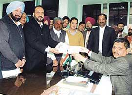Congress candidate from Bathinda Harminder Singh Jassi files his nomination papers in the presence of Chief Minister Capt Amarinder Singh in Bathinda on Thursday.