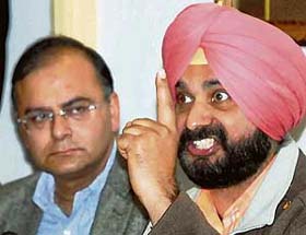 Cricketer-turned-politician and BJP candidate for the Amritsar Lok Sabha seat Navjot Singh Sidhu addresses a press conference with party leader Arun Jaitley in Amritsar