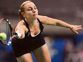 Severine Bremond of France in action against compatriot Marion Bartoli in the first round of the Pan Pacific Open in Tokyo