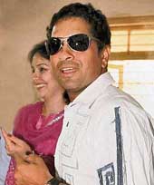 Sachin Tendulkar and his wife Anjali after casting their votes during the municipal elections in Mumbai on Thursday.