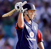 England�s Ed Joyce celebrates on completing his century during the tri-series one-dayer against Australia in Sydney on Friday. 