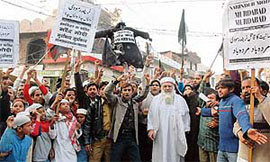 Majlis-e-Ahrar activists protest against the visit of the Gujarat Chief Minister, Mr Narendra Modi, in Ludhiana