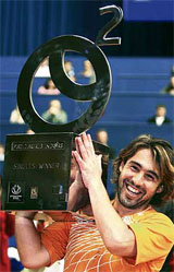 Marcos Baghdatis of Cyprus holds the trophy after beating Croatia�s Ivan Ljubicic in the final of the Zagreb tennis tournament