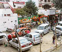 Hired vehicles parked in front of the office of a BJP candidate in Jalandhar on the eve of the elections for ferrying voters to polling booths