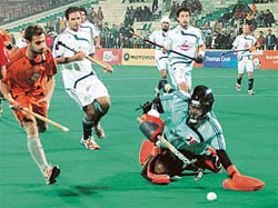 Maratha Warriors� goalkeeper Gurpret Singh makes a save during the PHL match against Bangalore Lions at the Sector 42 Hockey Stadium in Chandigarh 