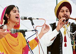 A participant presents a folk song during the Folk Festival that started at Baba Farid Institute of Higher and Foreign Studies in Bathinda 