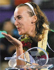 Russia�s Yaroslava Shvedova acknowledges the crowd after beating Italy�s Mara Santangalo in the final of the Bangalore Open tennis tournament 