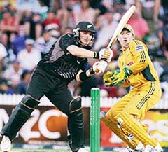 New Zealand�s Brendon McCullum plays a hook as Australian wicketkeeper Brad Haddin looks on during the third match of the Chappell-Hadlee series at Seddon Park in Hamilton