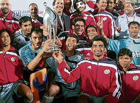 Members of the Orissa Steelers team hold the PHL trophy after beating Sher-e-Jalandhar 4-3 in the third final at the Sector 42 Hockey Stadium in Chandigarh on Monday.