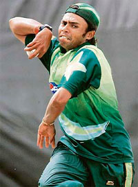 Pakistan�s Danish Kaneria delivers a ball during a practice session in Kingston 