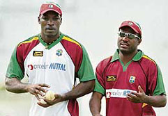 West Indies captain Brian Lara (right) with team-mate Chris Gayle during a practice session at the Antigua Recreation Ground in St John�s on Sunday. West Indies take on Australia in the first Super Eight match on Tuesday.