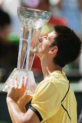 Novak Djokovic of Serbia kisses the trophy after beating Argentina�s Guillermo Canas in the final of the Sony Ericsson Open in Miami on Sunday. Djokovic won 6-3, 6-2, 6-4. 