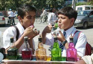 With the rising temperature in the city, these ice-candies come to the rescue of the school children who appear to enjoy every slurp of it on Tuesday. 