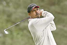 Jeev Milkha Singh tees off on the fourth hole during the second round of the 71st US Masters golf tournament in Augusta
