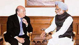 FIFA president Sepp Blatter talks to Prime Minister Manmohan Singh during a meeting in New Delhi.