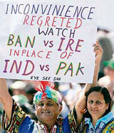 A fan holds a banner during the match between Ireland and Bangladesh in Bridgetown.