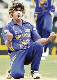 Sri Lanka�s Lasith Malinga celebrates after dismissing New Zealand captain Stephen Fleming during the first semifinal in Kingston on Tuesday. 