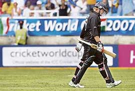 New Zealand�s Scott Styris leaves the field after being dismissed during their World Cup semifinal match against Sri Lanka in Kingston on Tuesday.