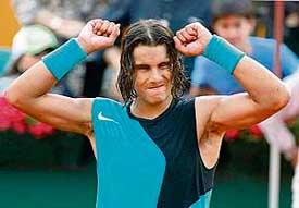 Spain�s Rafael Nadal celebrates after beating Italian Potito Starace during the quarterfinals of the Barcelona Open tennis tournament on Friday. 