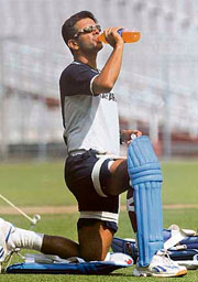 Rahul Dravid takes a drink before a practice session in Kolkata.