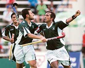 Pakistan�s Akhtar Ali (right) celebrates with Rehan Butt after scoring his team�s second goal against Canada during their match at the Sultan Azlan Shah Cup hockey tournament in Ipoh on Tuesday. 