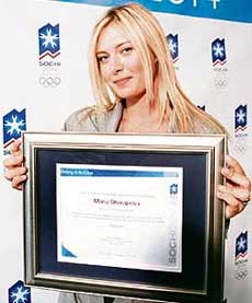 Tennis star Maria Sharapova with a plaque she received as the ambassador for Russian city Sochi�s bid for the 2014 Winter Olympics during a press conference in Los Angeles on Wednesday. 