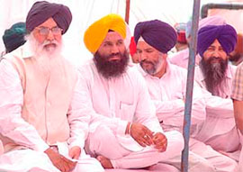 Chief Minister Parkash Singh Badal, Jagtar Singh Ranjhla, Tejender Pal Singh Sandhu and Surjit Singh Garhi at a programme to observe the 17th death anniversary of Hardial Singh Rajla, who was killed in a terrorist attack, at Rajla village in Patiala district.