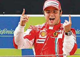 Ferrari driver Felipe Massa celebrates after winning the Spanish Grand Prix on the Catalunya racetrack in Montmelo, near Barcelona