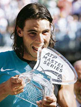 Spain�s Rafael Nadal holds the ATP trophy after winning the Rome Masters tennis tournament on Sunday. Nadal beat Chile�s Fernando Gonzalez 6-2, 6-2 in the final. This was his 77th consecutive victory on clay.