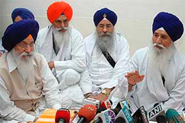 SGPC chief and Sikh high priests at the Akal Takht secretariat on Tuesday.