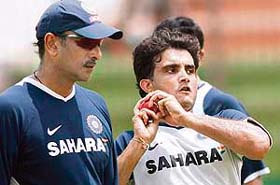Team India manager Ravi Shastri watches as Sourav Ganguly delivers a ball during a net practice session at the Ruhul Amin Cricket Stadium in Chittagong