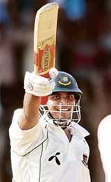 Bangladesh�s Mashrafe Mortaza celebrates on completing his fifty on the fourth day of the first Test against India in Chittagong on Monday. 