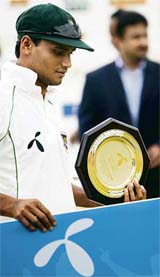 Mashrafe Mortaza of Bangladesh holds his man of the match award during the prize distribution ceremony on the conclusion of the first Test in Chittagong on Tuesday.