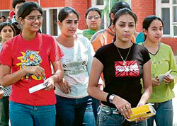 Candidates come out of examination centre after appearing for entrance test for 5-year integration law course at Rajiv Gandhi National University of Law in Patiala on Saturday.