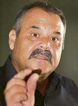 Bangladesh�s outgoing coach Dav Whatmore addresses a press conference in Dhaka on Monday.