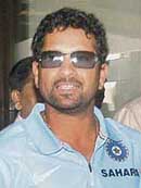 Sachin Tendulkar arrives at the Mumbai airport after the completion of the Bangladesh tour on Monday. 