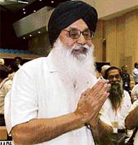 Punjab Chief Minister Parkash Singh Badal gestures at the National Development Council meeting in New Delhi