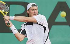 NEVER SAY DIE: Lleyton Hewitt of Australia in action against Gaston Gaudio of Argentina during the second round of the French Open in Paris on Thursday. Hewitt won 4-6, 3-6, 6-2, 6-4, 6-2. � AFP photo