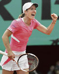 Belgium�s Justine Henin celebrates after defeating Serbia�s Jelena Jankovic.