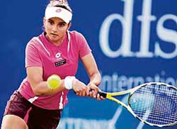 Sania Mirza hits a return to Italy�s Maria Elena Camerin during her first-round match at the DFS Classic tennis tournament in Birmingham
