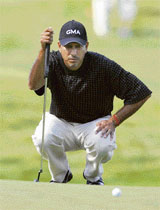 Jeev Milkha Singh lines up a putt on the 18th hole during the first round of the US Open Golf Championship in Oakmont, Pennsylvania, on Thursday.