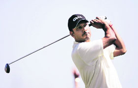 Jeev Milkha Singh watches his shot from the eighth tee during the second round at the US Open Golf Championship in Oakmont, Pennsylvania, on Friday.