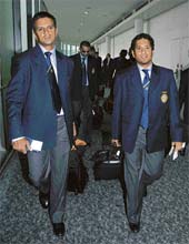 Rahul Dravid and Sachin Tendulkar arrive at the Heathrow airport in London on Wednesday. 
