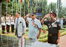 Brig K.K. Kaul (retd) and Brig J.P.Singh salute at the war memorial of the 1971 war on the 38th Raising Day of the 16 Independent Armoured Brigade