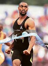 Tyson Gay breasts the tape to win the 200m sprint at the US Track and Field Championship in Indianapolis on Sunday. Gay clocked 19.62 seconds, the second-fastest of all time. He had won the 100m dash in 9.84 seconds on Friday.