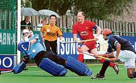 Prabhjot Singh scores the match-winner against England during a league fixture of the Champions Challenge hockey tournament at Boom, Belgium, on Sunday. India won 3-2. 
