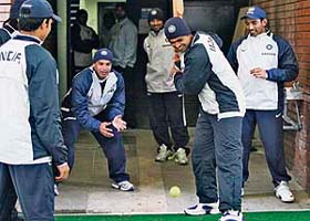 Indian cricketers share a light moment during a practice session in Belfast on Thursday. India play South Africa in the second one-dayer